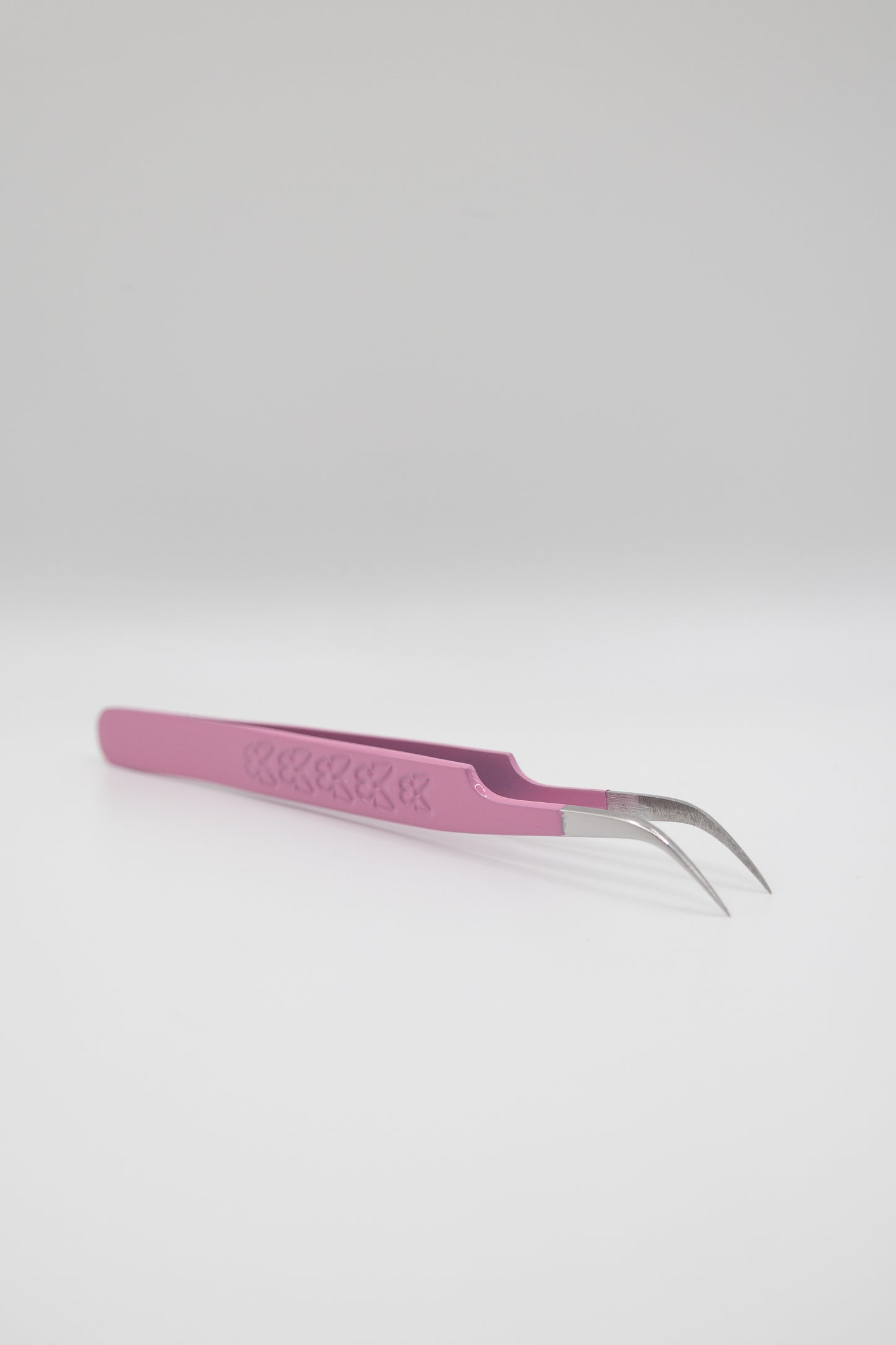 J Curve Tweezer